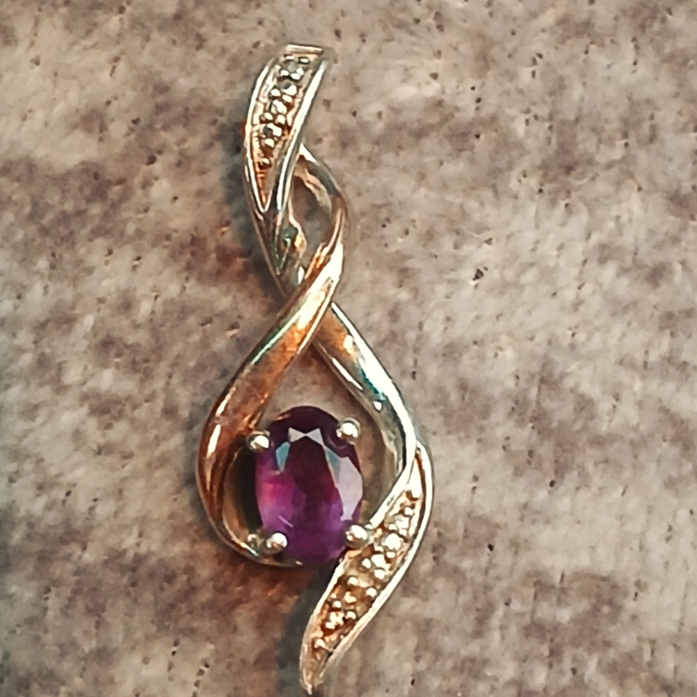 Amethyst silver and 10k necklace pendant.